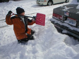 [Taylor trying to unbury the car]